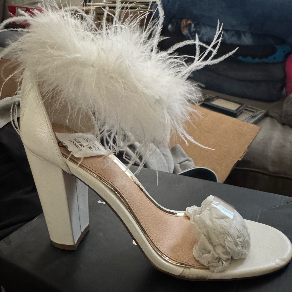 White feathered heels